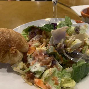 Salad and croissant