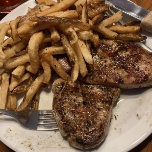 Pork chops and Hand - cut French Fries