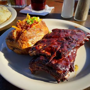 Ribs (so good) and loaded baked potato