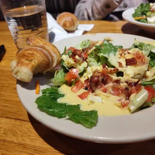 Cinnamon butter croissant and side salad with hot bacon dressing and honey mustard