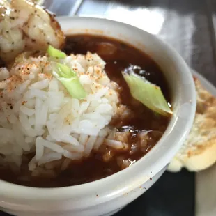 a bowl of chili and rice