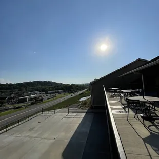 the sun setting over a parking lot