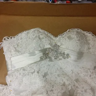 Photo of RAGtimeDesigns. This Maggie Sottero gown had a completely different bodice. Able to make it the brides dream dress...
