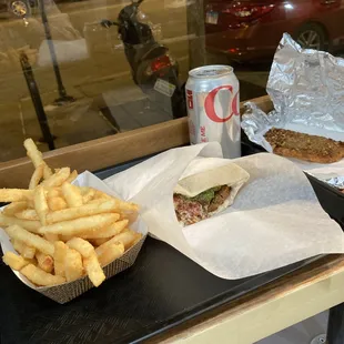 Fries, stuffed pita, can of pop, and a hand pie, $19.64, inc. tax