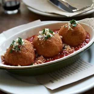 Fried Arancini
porcini mushrooms, smoked mozzarella &amp; Arrabiata sauce