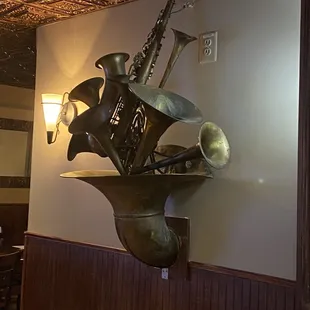 a musical instrument mounted on a wall
