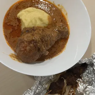Fufu with peanut soup and fried chicken
