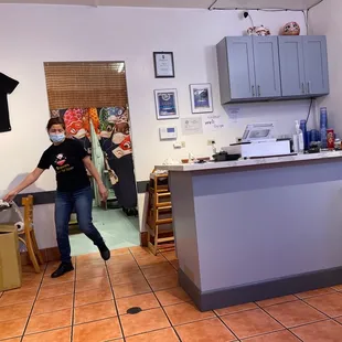 a woman in a kitchen