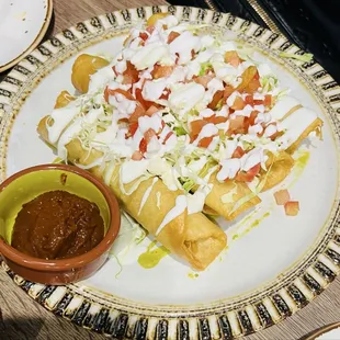 Chicken flautas / tacos dorados.
