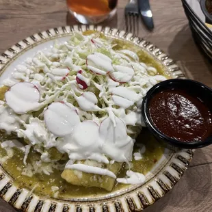 Salsa verde enchiladas with a side of Mole sauce