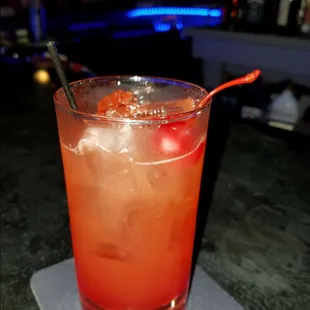 a drink in a tall glass