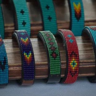 a variety of beaded bracelets