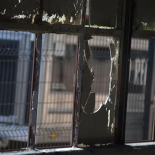 broken window panes in an abandoned building