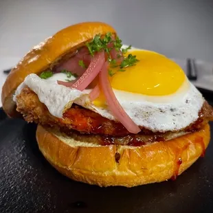 a fried egg and bacon sandwich