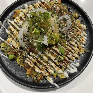 Cabbage pancake - Savery and a little sweet, this is one of Railbird&apos;s signature items.