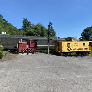 a man standing in front of a train