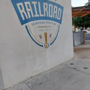 a sign on the side of a building