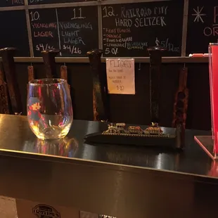 a glass of wine on a counter