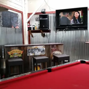 a pool table and television