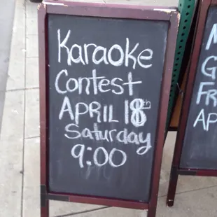 a chalkboard sign for karaoke contest