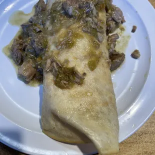 Breakfast burrito with green chili sauce!!! Taste, bud explosion