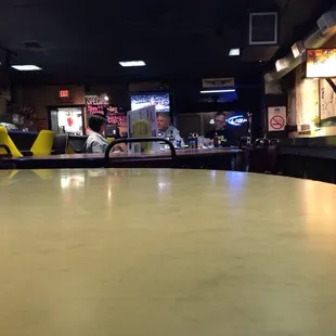 a man sitting at a table in a restaurant