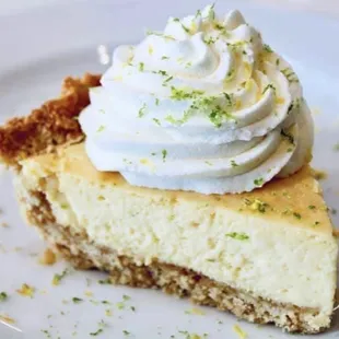 a slice of pie with whipped cream on top