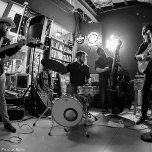 a band playing in a music studio