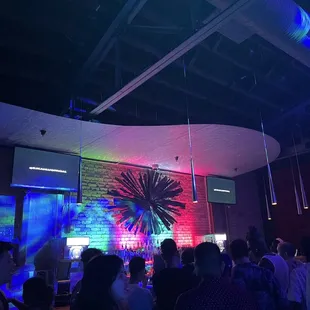 a crowd of people at a party