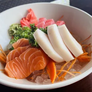 Sashimi sampler - white and red tuna, salmon ($14.95)