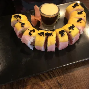 Tropical sushi with Spicy tuna, crab, avocado, mango &amp; caviar with spicy Mayo dressing