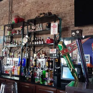 a bar with a lot of bottles