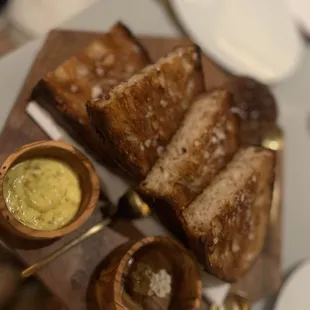 Bread with sunflower butter, honeycomb, and cheese spread... one of the best things there.
