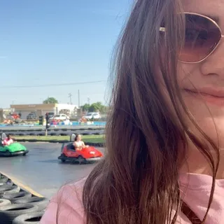 Laura E.