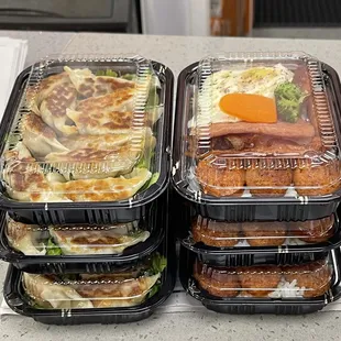 a variety of food in plastic containers