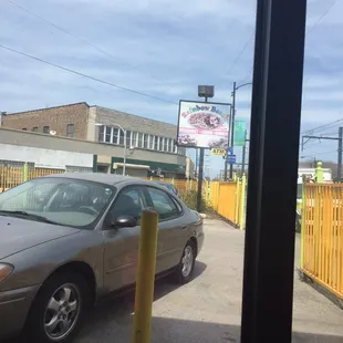 The sign. The entire gate is painted yellow.