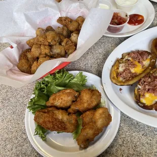 Chicken gizzards &amp; golden platter in the background my bf got French Toast Breakfast