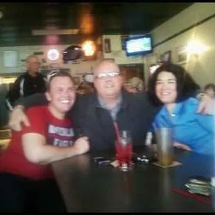 R-L Carlstrom, me, Roma. Pelshaws movin away party. Finally Conneaut will be free of that menace.