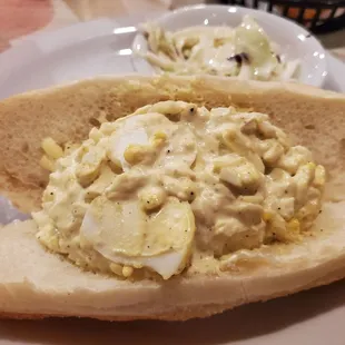 a white plate with a sandwich on it