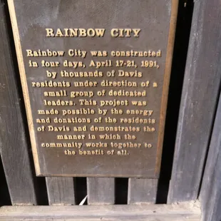 Plaque describing how and why Rainbow City was created