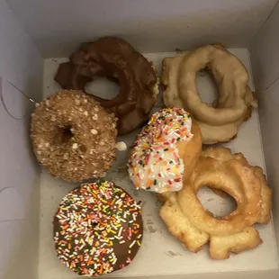 a variety of donuts in a box