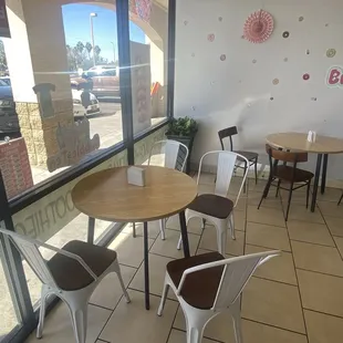 Some seating inside as well a three too behind me