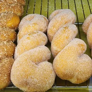Big and plump twisty donuts.