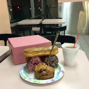 My latest doughnut masterpiece..a "driverless maple bar car" and my Korean long spoon in a blueberry muffin ;))