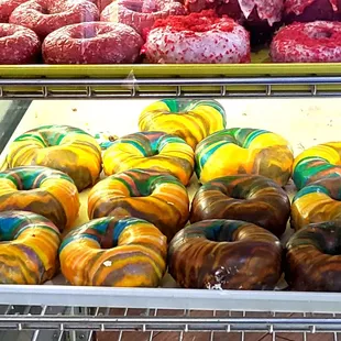 Rainbow donuts .... a great variety of cake like donuts as well as dough donuts.