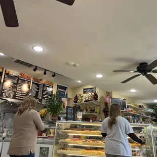 Front of store/checkout (donut display case is at bottom right) each morning it gets packed with treats of all shapes and sizes! Yumm