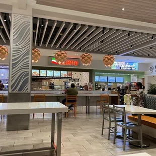 Lots of seating near Rainbow Drive In