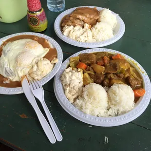 Beef curry, loco moco and roast pork with gravy.