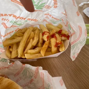a hot dog and french fries