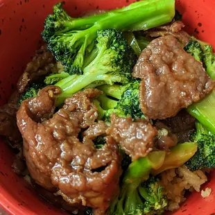 a bowl of beef and broccoli